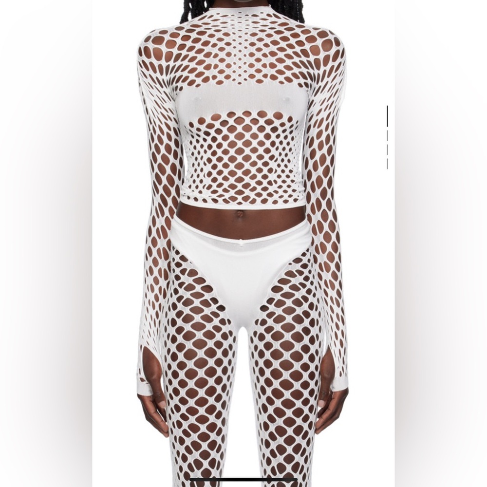 White Cur out T-shirt and matching leggings.